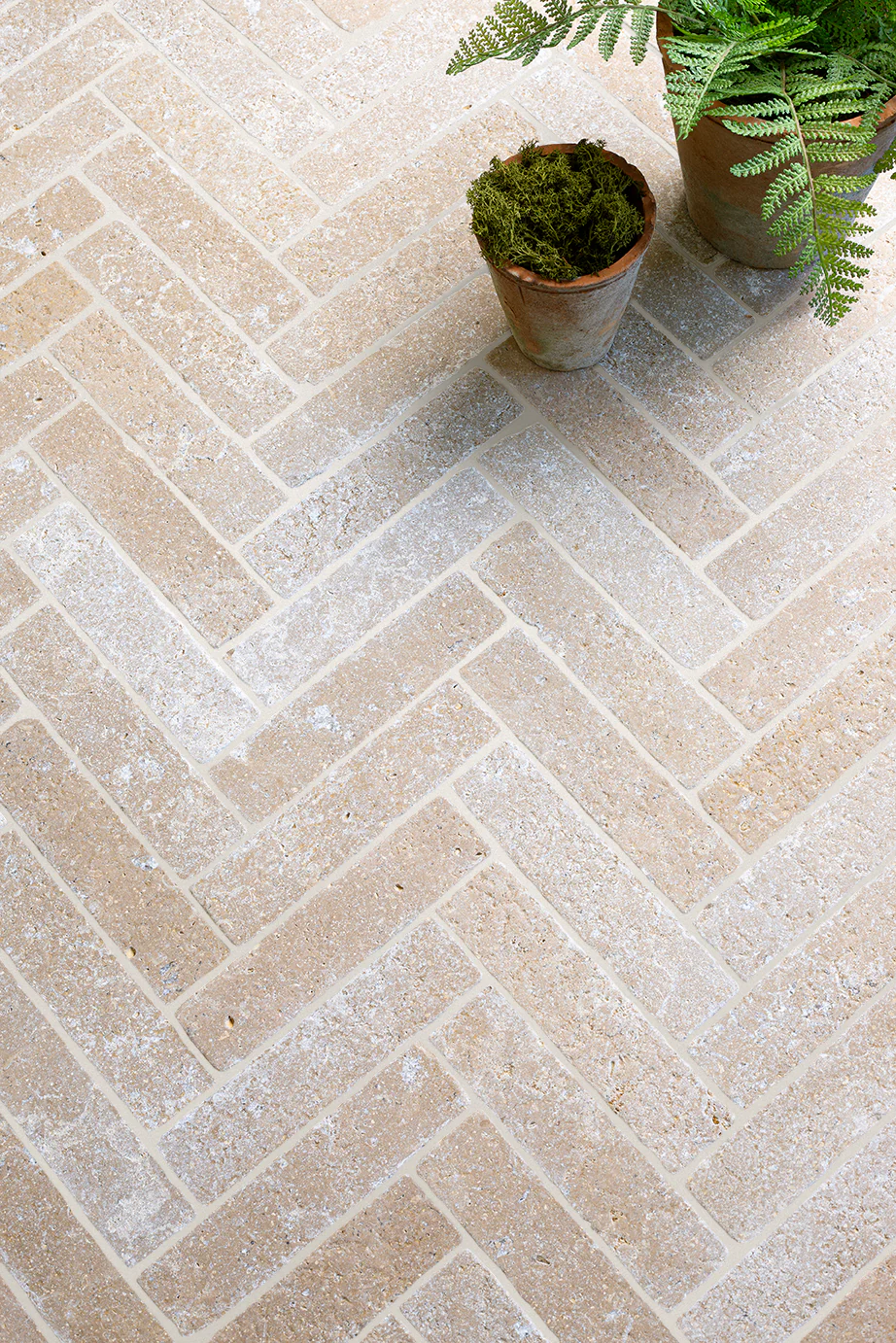 Dijon Seasoned Limestone Herringbone Cobbles