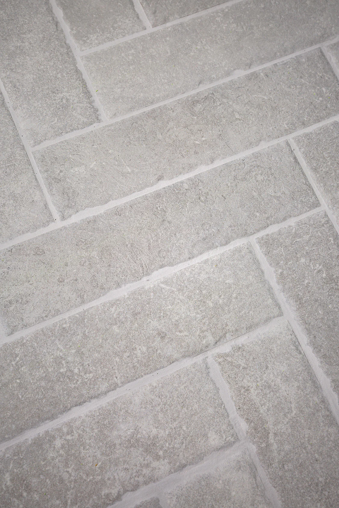 Hambleton Grey Tumbled Edge Porcelain Herringbone Cobbles - Image 2